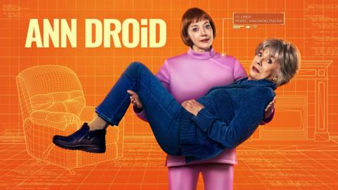 Diane Morgan starring as Ann Droid, holding Sue Johnston in her arms