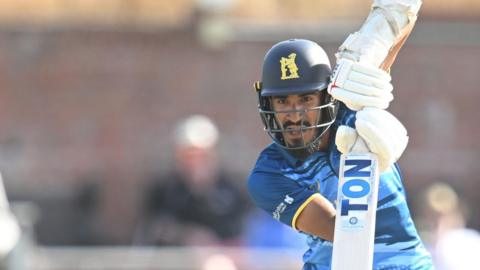 Hamza Shaikh plays a shot for Warwickshire