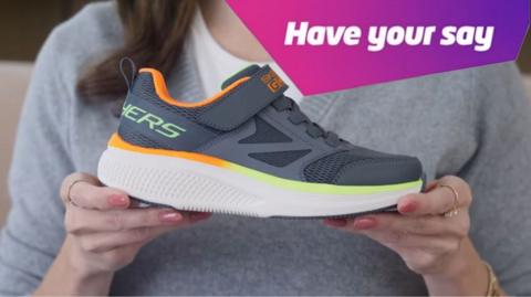 Sketchers trainer being held with text in the top right corner that reads: have your say. 
