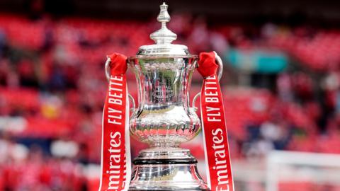 The FA Cup trophy on display prior to the FA Cup semi-final between Manchester City and Nottingham Forest