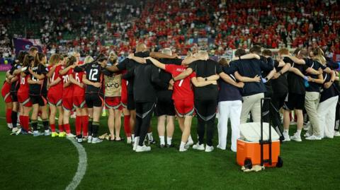 Wales players in a huddle