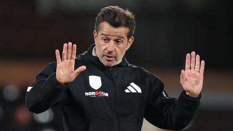 Marco Silva gestures with his hands on the touchline during the Carabao Cup Third Round match against Cambridge United