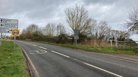 Planned site of homes and retail outlet on the A39 Long Cross