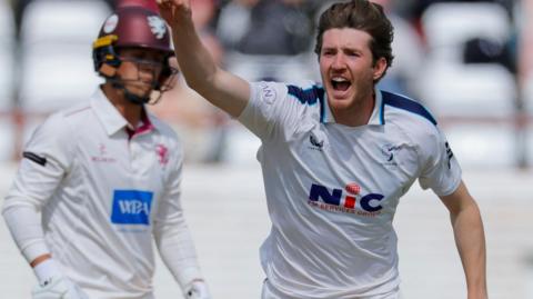 George Hill celebrates taking wicket