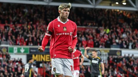 Wrexham forward Josh Windass celebrates