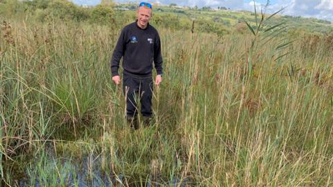 Gareth Thomas making his way slowly across Crymlyn's quaking bog