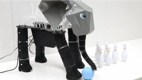 EleBot with a bowling ball and pins 