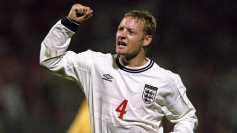 David Batty gees up the crowd during England's European Championship qualifier against Poland at the Legia Stadium in Warsaw on 8 September, 1999