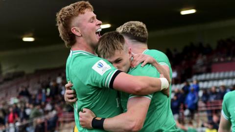 Finn Treacy celebrates try