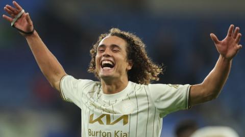 Goalscorer Charlie Webster of Burton Albion celebrates at Cardiff