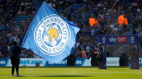 Leicester City flag being waved at King Power Stadium