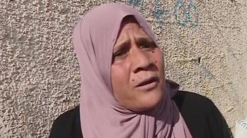 A woman in the cooking gas queue in Deir al-Balah who raged at being abandoned