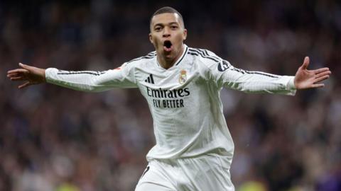 Kylian Mbappe celebrates scoring for Real Madrid