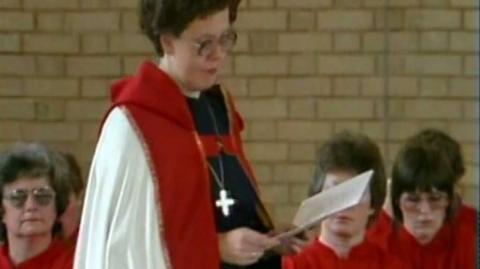 A female clergy member of the Church of England.