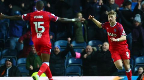 Sindre Walle Egeli celebrates his goal with Ipswich team-mate Ashley Young