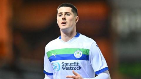 Jon Mellish in action for parent club Wigan Athletic