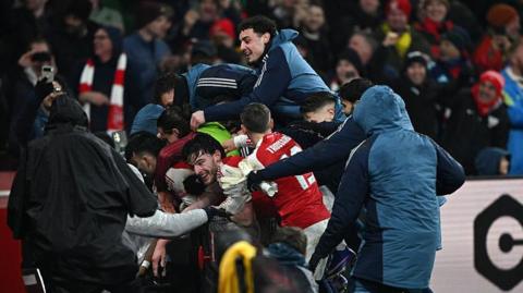 Arsenal celebrate against Chelsea