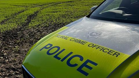 The front of a rural crime police car