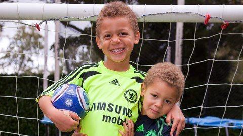 Brothers Sebastien and Landon pictured in Chelsea jerseys