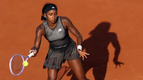 Coco Gauff hits a forehand