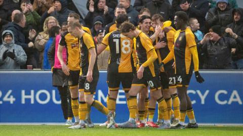 Michael Spellman of Newport County celebrates his goal