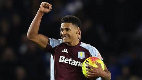 Ollie Watkins celebrates scoring against Brighton