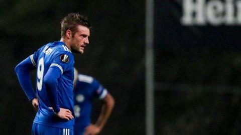 Jamie Vardy stands disappointed after a Europa League game
