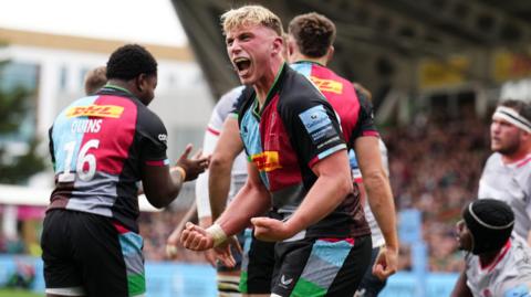 Harlequins’ Jack Kenningham reacts after stopping a try during the Premiership match against Saracens