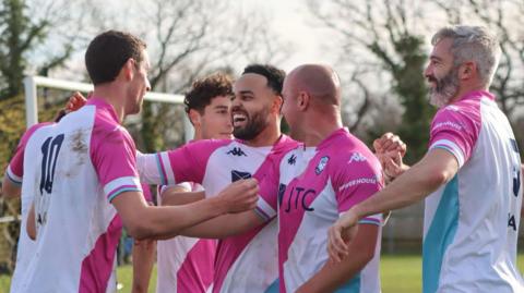 Jersey Bulls players celebrating