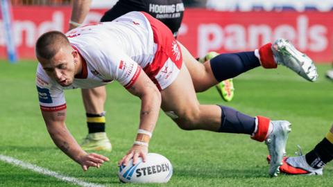 Hull KR's Mikey Lewis touches down to score a try against York Knights