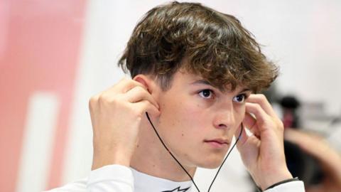 Oliver Bearman in the Haas garage 