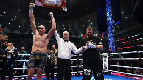 Tyson Fury has his hand raised