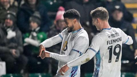 Burnley's Josh Laurent and Zian Flemming celebrating Laurent's goal