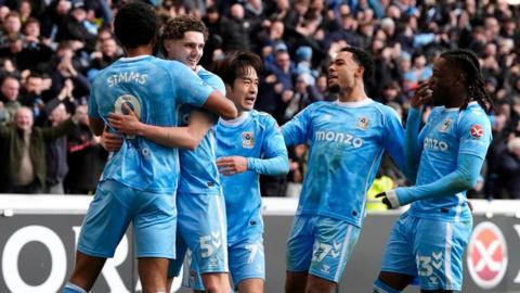 Coventry players celebrate with match-winner Jack Rudoni