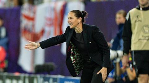 Rhian Wilkinson on the touchline