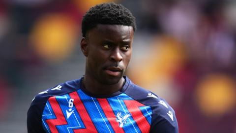 Marc Guehi during a warm-up with Crystal Palace