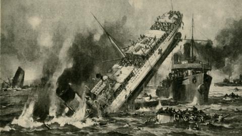 A black and white illustration of the HMHS Anglia, a World War One hospital boat. It has been drawn as sinking in the sea surrounded by lifeboats. 