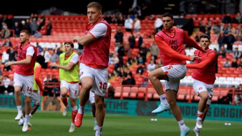 Charlton players warm up at The Valley