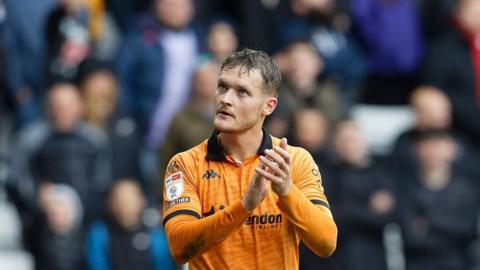 Sean McLoughlin applauding Hull City fans