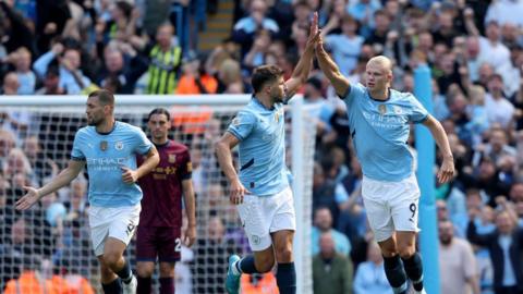 Ruben Dias of Manchester City and Erling Haaland of Manchester City celebrate after 2nd goal during the Premier League match between Manchester City FC and Ipswich Town FC