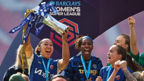 Chelsea players celebrate winning the WSL