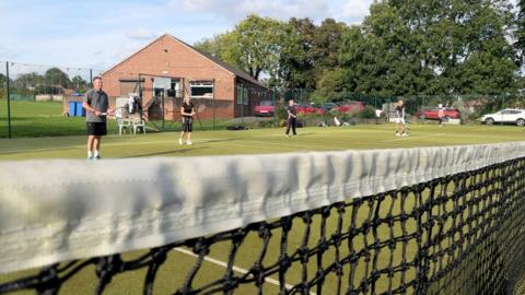 Players on court at Littleover Valley Tennis Club