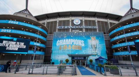 An external picture of Manchester City 's Etihad Stadium