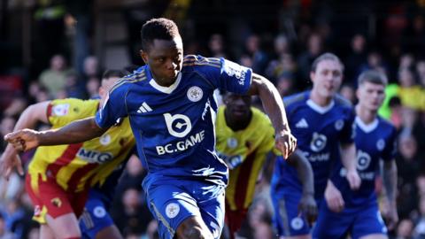 Leicester City's Patson Daka taking a penalty that is saved by Watford goalkeeper Egil Selvik