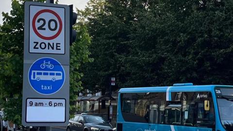 Bus lane at Mount Pleasant Road showing a 20mph sign, and another saying cycles, buses and taxis only between 9am and 6pm