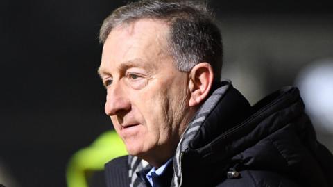 Huw Jenkins looks on from the sidelines