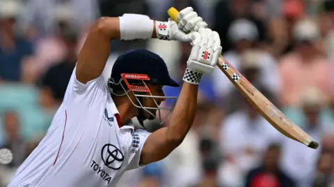 England opener Emilio Gay plays a shot