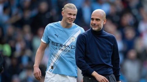 Erling Haland and Pep Guardiola smiling