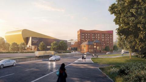 A computer-generated artist's impression of a hotel. A dual carriageway has a steady stream of cars on it while people walk along a path next to it. Across the road is a brown seven-storey building which says "Moxy" in pink lettering. Next to it is a stadium with a yellow building behind it with lettering that reads "Connexin Live".