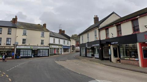 A Google Maps street view screenshot of a road in Ottery St Mary, Devon